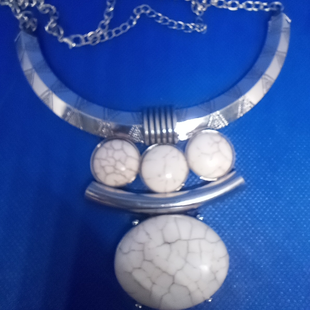 Necklace, bracelet and earrings
